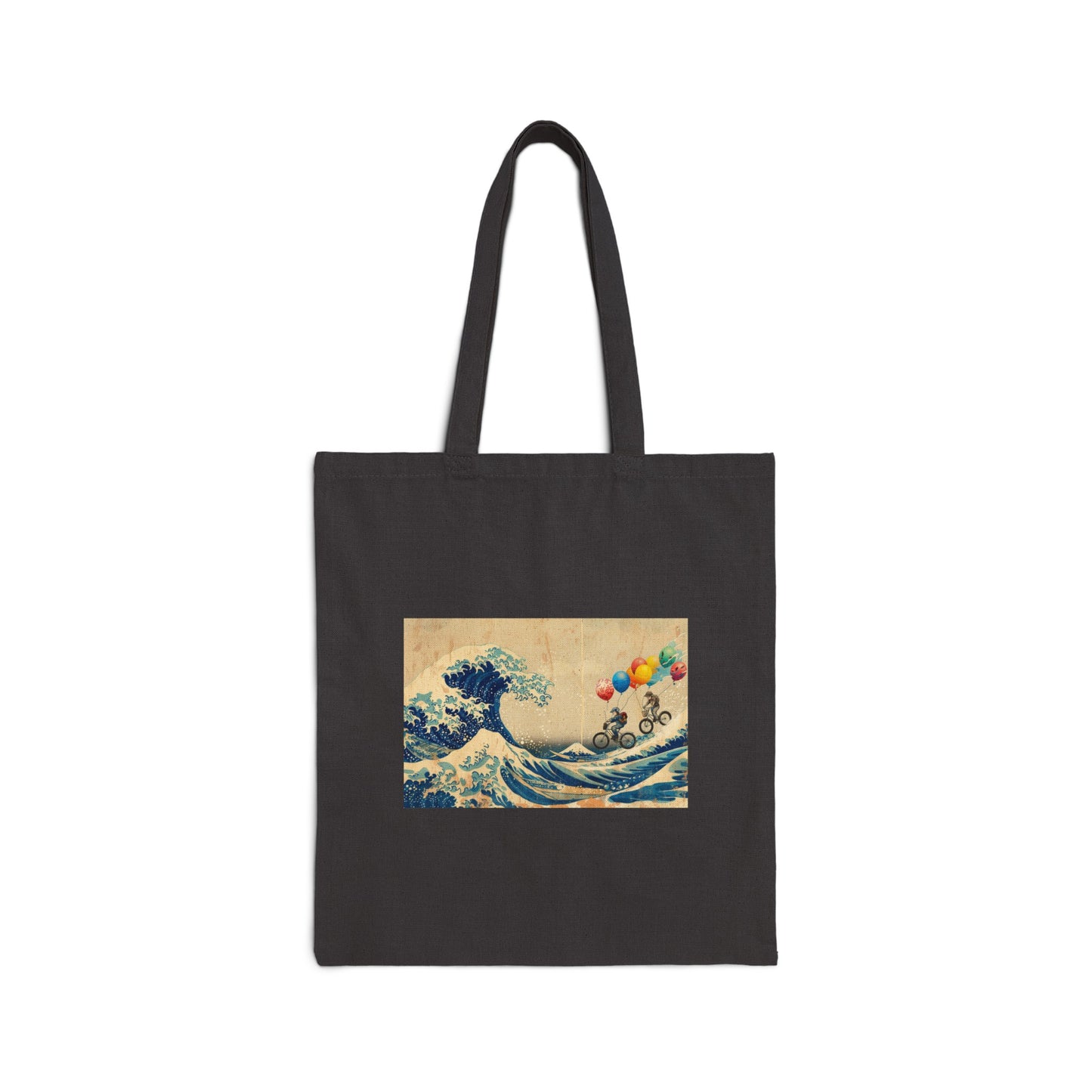 Black canvas tote bag featuring a design of bicycle riders with balloons on Hokusai's The Great Wave. The illustration combines the iconic wave with whimsical cyclists and colorful balloons, creating a unique and artistic composition.